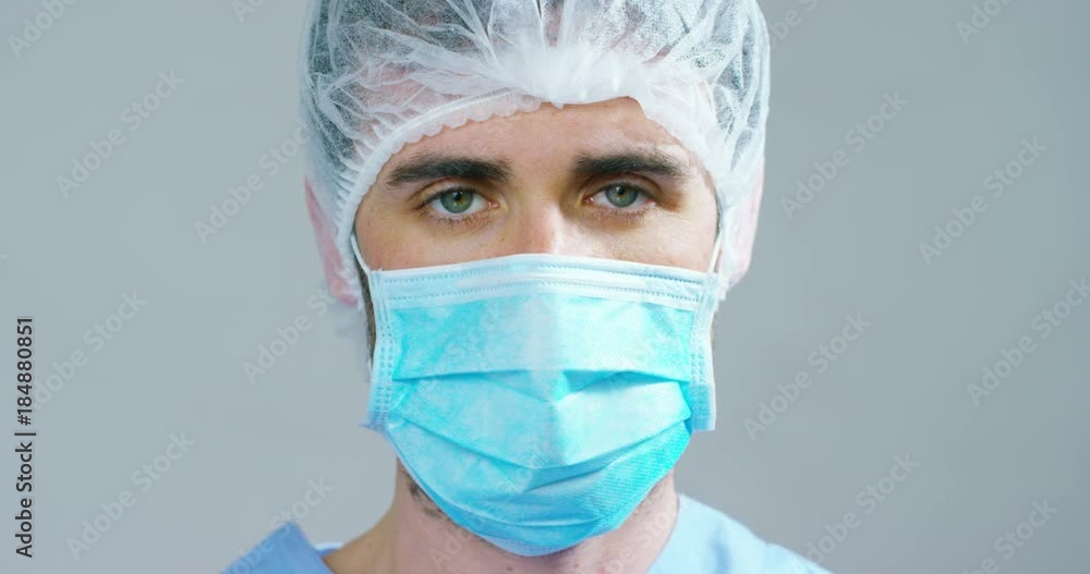 Portrait of a physician or surgeon who looks proud room, happy and smiling for his work in the clinic or hospital. Concept: doctor, patient care, health and wellness in hospitals or private clinics Portrait of a physician or surgeon who looks proud room, happy and smiling for his work in the clinic or hospital. Concept: doctor, patient care, health and wellness in hospitals or private clinics