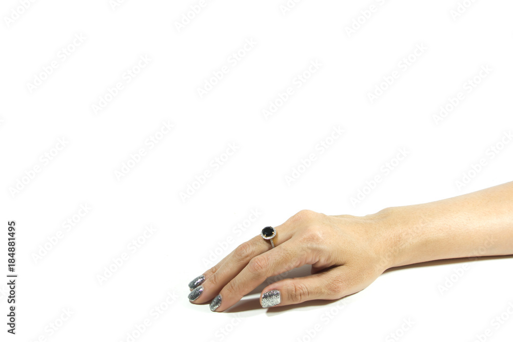 Hand female wears a black diamond ring with middle finger a diamond on white background. Hand female wears a black diamond ring with middle finger a diamond on white background.