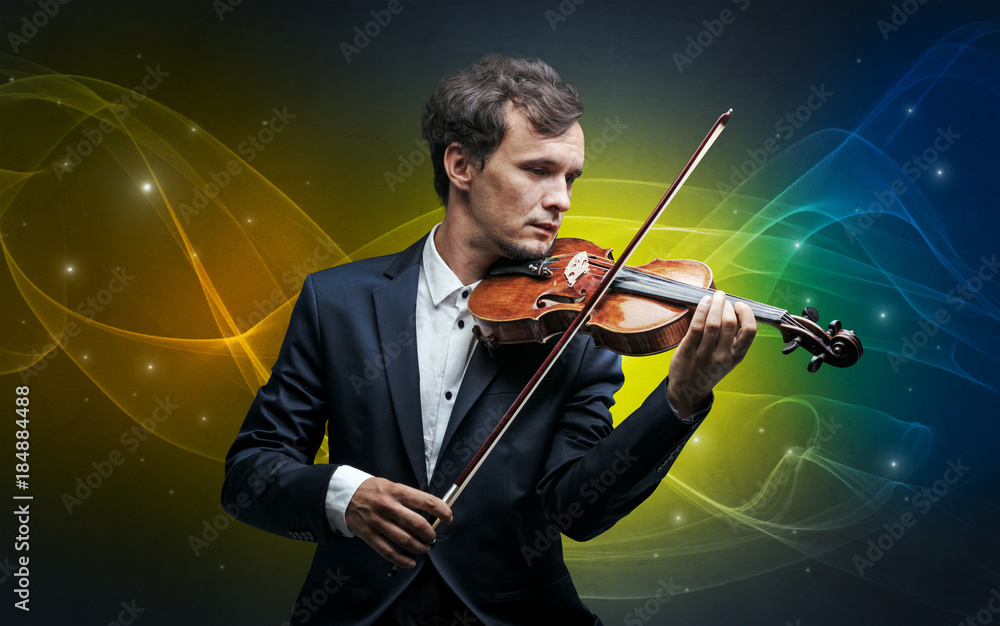 Fototapeta premium Violinist with colorful fabled concept