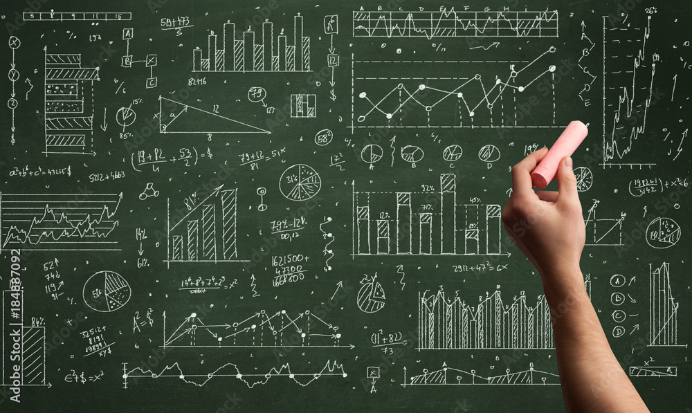 A business person drawing data on chalkboard A business person drawing data on chalkboard