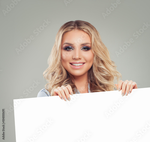 Happy Blonde Woman Fashion Model with White Paper Banner Background