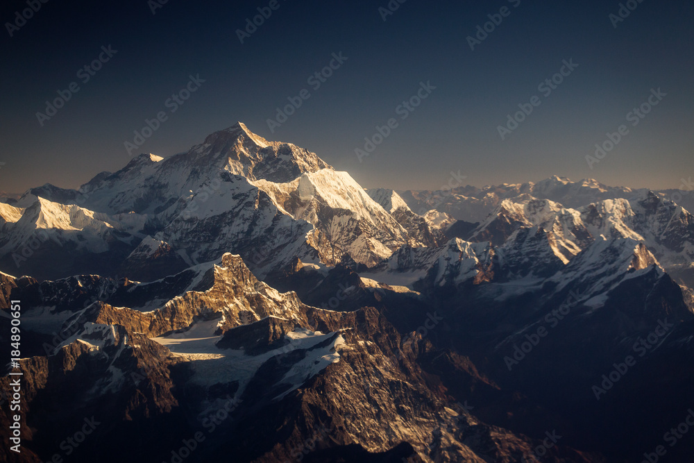 Beautiful landscape with Everest Peak in background at sunrise, view from above. Himalaya Mountains, Nepal