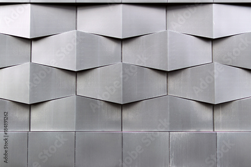 Close-up of gray geometric building facade