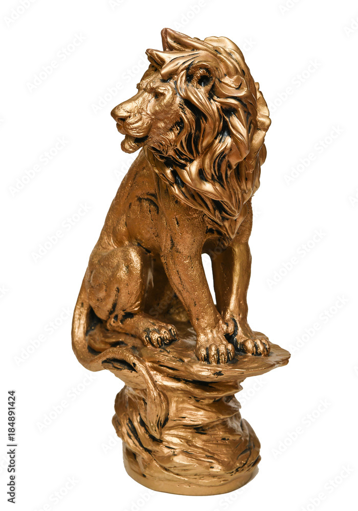 The lion sits on a pedestal isolated on a white background. The lion sits on a pedestal isolated on a white background.