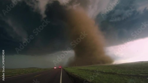 Dusty Tornado With Storm Chasers photo