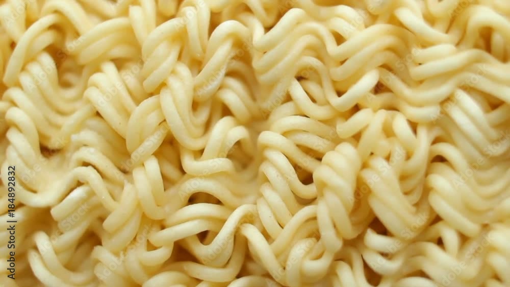Background of instant noodles rotating close up Background of instant noodles rotating close up