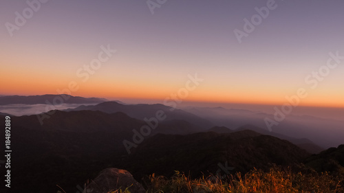 Beautiful Natural Sunset Sunrise Over Khao Mokoju Summit Mokoju Mountain, Mae Wong National Park, Thailand. photo