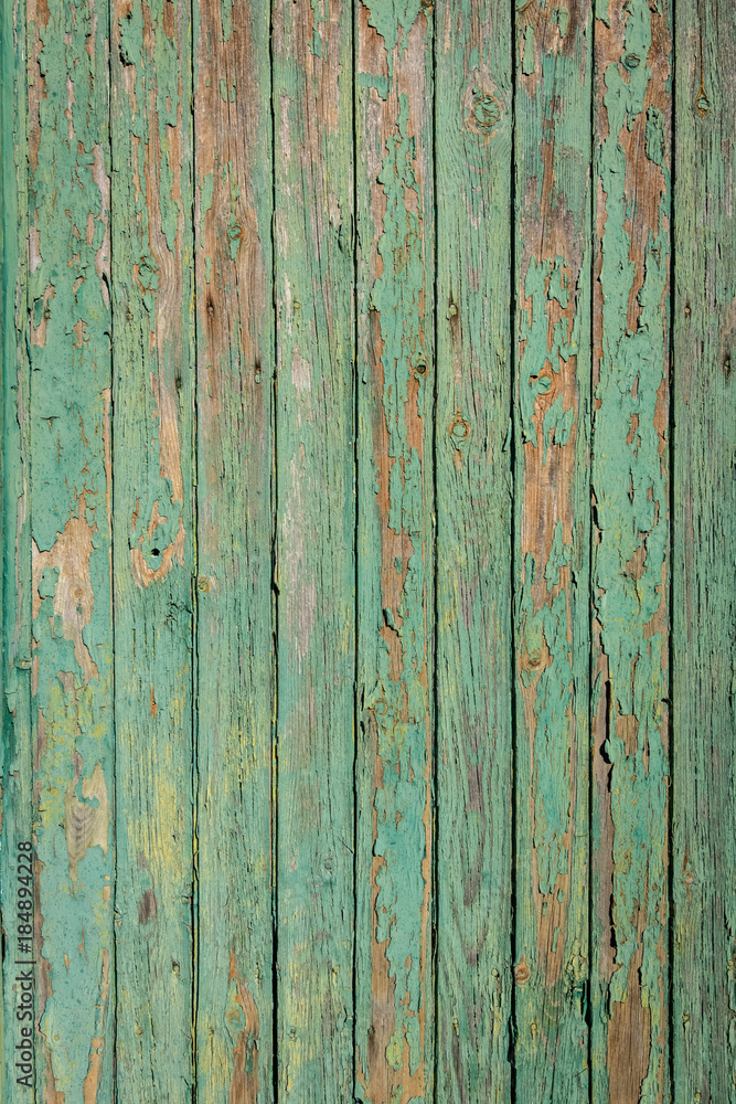 Old green and brown wood with peeling paint and natural patterns nice for background Old green and brown wood with peeling paint and natural patterns nice for background