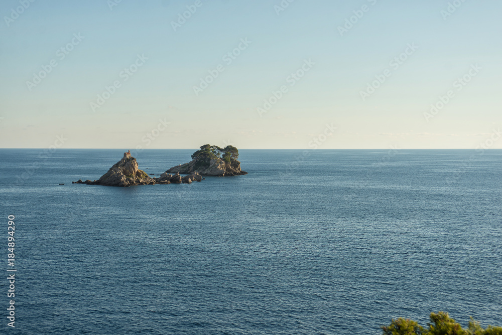 Two islands in Adriatic sea near Petrovac. Katic and Sveta Nedelja islands in Montenegro.