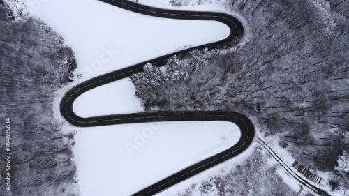 Aerial view of a mountain road in winter in Austria taken with a copter, drone
