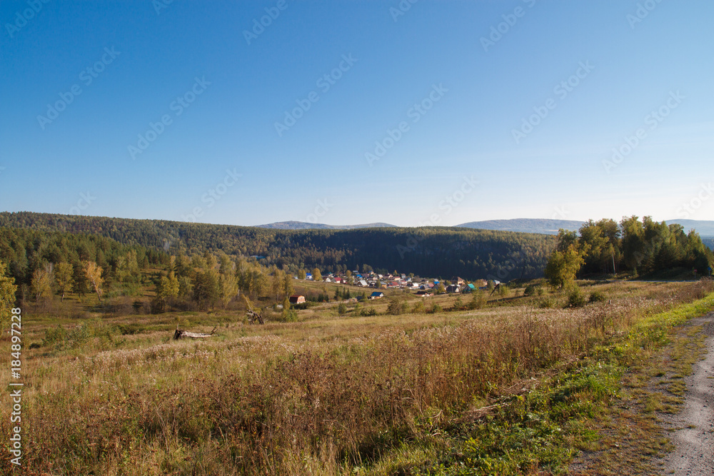 Fototapeta premium Village in the valley