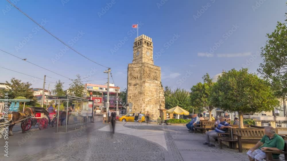 Clock tower in the Historic part of Antalya Kaleici timelapse hyperlapse, Turkey. Old town of Antalya is a popular destination among tourists