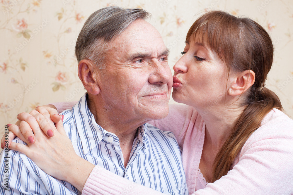 Senior man, woman with their caregiver at home. Senior man, woman with their caregiver at home.