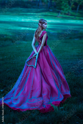 Elf woman in violet dress
