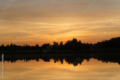 Fototapeta Naklejka Na Ścianę i Meble -  Beautiful  red sunset at lake