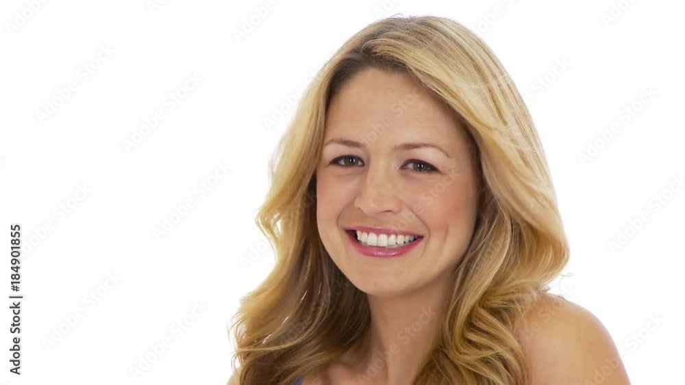 Sexy young woman smiling at camera on white background Sexy young woman smiling at camera on white background