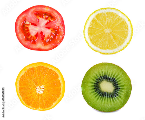 A Kiwifruit Slice and Lemon Slice and Orange slice and tomato Slice  isolated on white