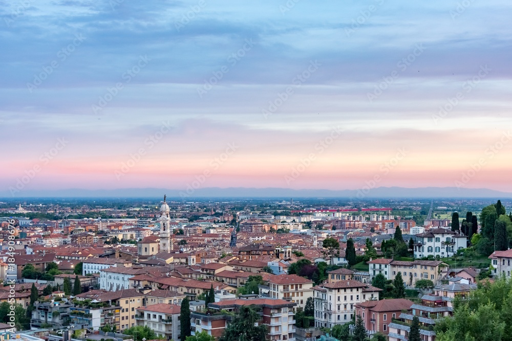A romantic panoramic view to the city of Bergamo when the sun goes down