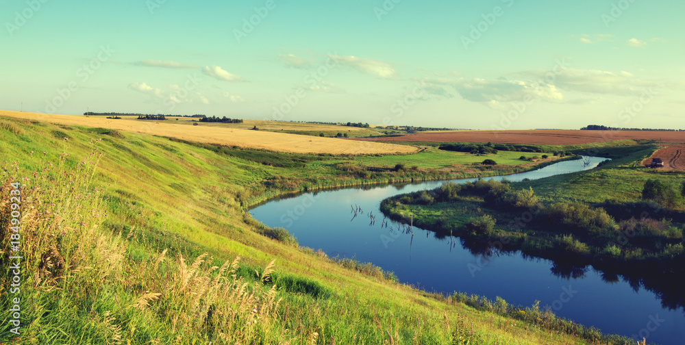 Sunny summer landscape.River Upa in Tula region, Russia.Wheat fields an sunrise.Beautiful view. Sunny summer landscape.River Upa in Tula region, Russia.Wheat fields an sunrise.Beautiful view.