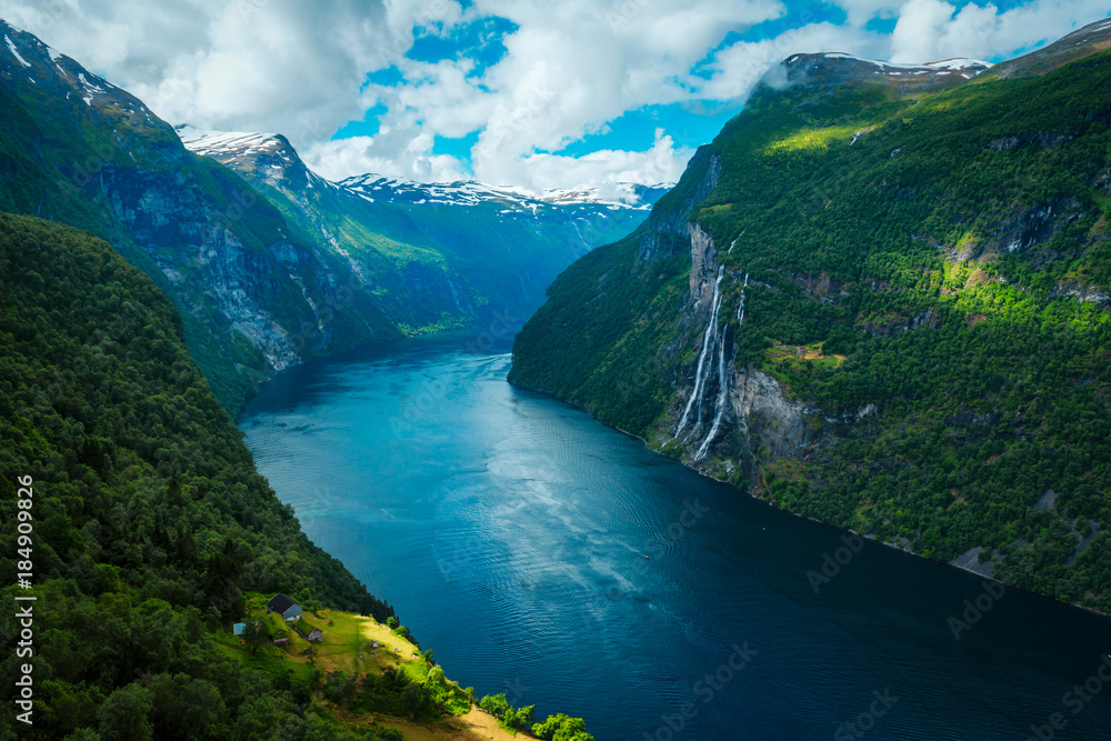 Breathtaking view of Sunnylvsfjorden fjord and famous Seven Sisters waterfalls, near Geiranger village in western Norway.