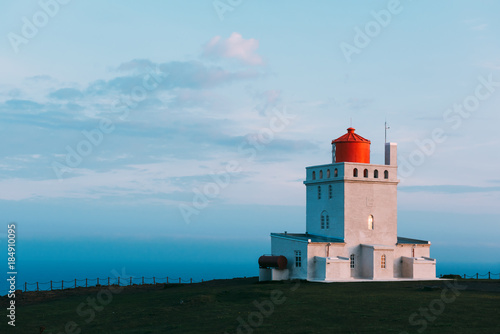 White lighthouse at Cape Dyrholaey, Iceland. Landscape photography