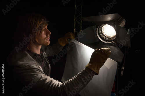 Foto Lighting technician and studio light