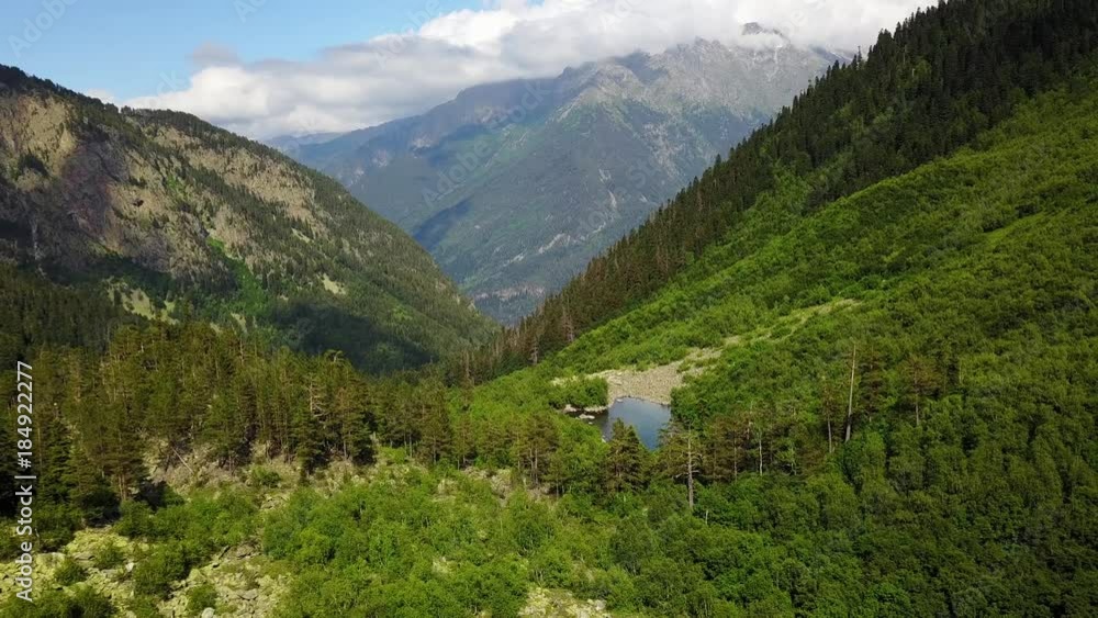 Mountain landscape in the summer time. Beautiful natural video of mountains from air Mountain landscape in the summer time. Beautiful natural video of mountains from air