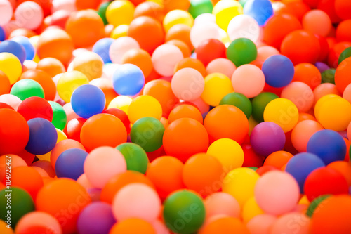 Colourful plastic balls pool background.