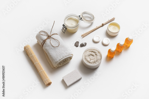 Spa and beauty threatment products composition on white paper background.
