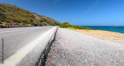 Road on a sea shore. Greece  Rhodes.