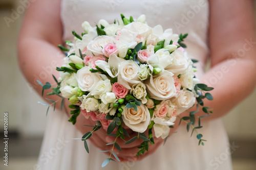 Bride with wedding bouquet  closeup