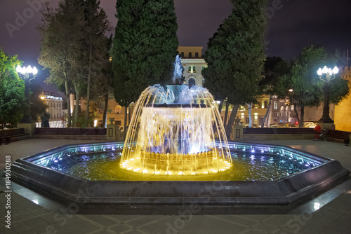 Sabir square fountain, Baku, Azerbaijan at night. The fountain in the city center. Baku Azerbaijan . night vision of a round park Fountains square