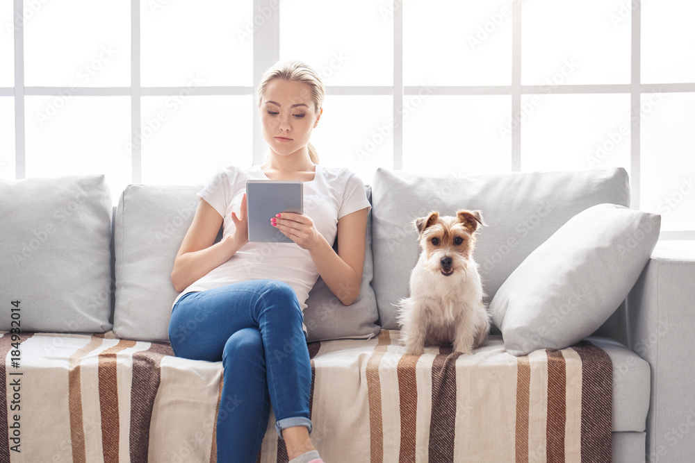 Young person with dog at home leisure Young person with dog at home leisure