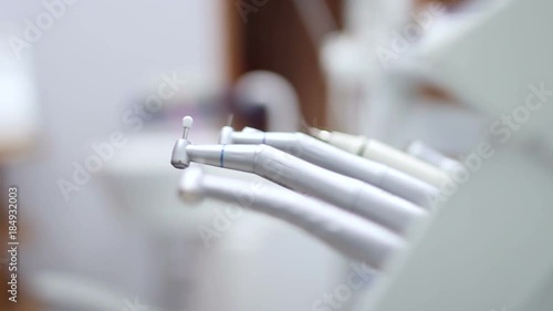 Dental Instruments At Dental Installations. Close Up Macro. photo