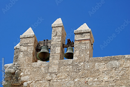 Bells against the sky in Beit Jimal (or Beit Jamal) Catholic monastery near Beit Shemesh, Israel photo