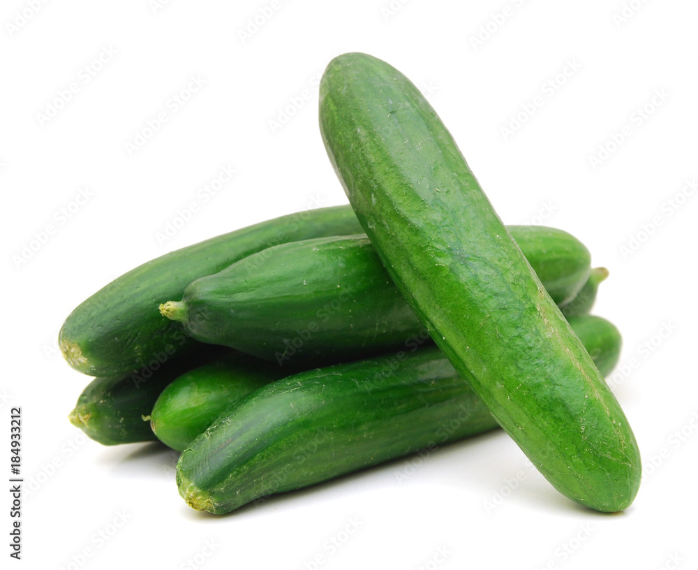 Healthy food. The green cucumbers isolated on white background Healthy food. The green cucumbers isolated on white background