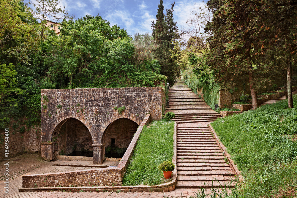 Volterrra, Pisa, Tuscany, Italy: the ancient Fonte di Docciola, a fount built in 1254 at the entrance of the old town Volterrra, Pisa, Tuscany, Italy: the ancient Fonte di Docciola, a fount built in 1254 at the entrance of the old town