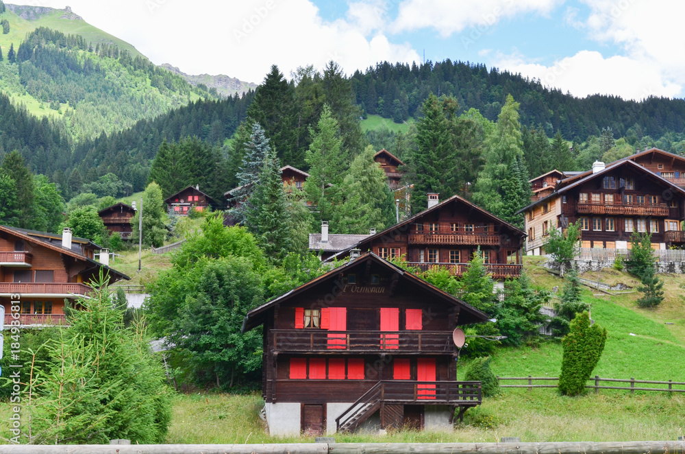 Villages with mountain background in Switzerland. Villages with mountain background in Switzerland.