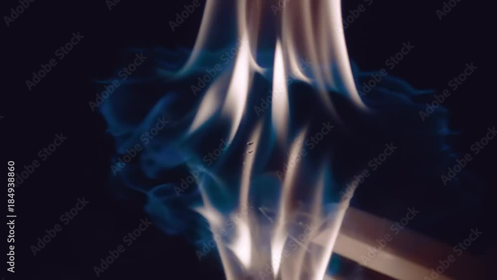 Ignition of gasoline with an electric lighter with a lot sparks on black background. The blue wave of fire diverges in a circle. Macro. Closeup. Slow motion, high speed camera, 240fps, 250fps Ignition of gasoline with an electric lighter with a lot sparks on black background. The blue wave of fire diverges in a circle. Macro. Closeup. Slow motion, high speed camera, 240fps, 250fps