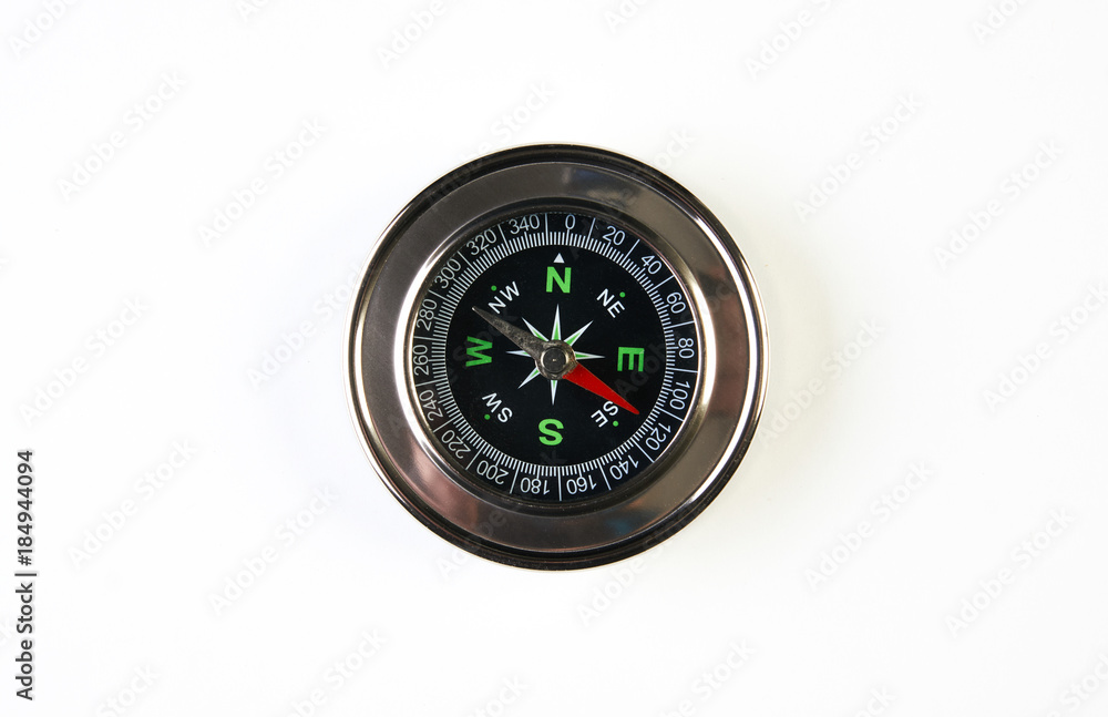 Magnetic compass isolated on white background with copy space Magnetic compass isolated on white background with copy space