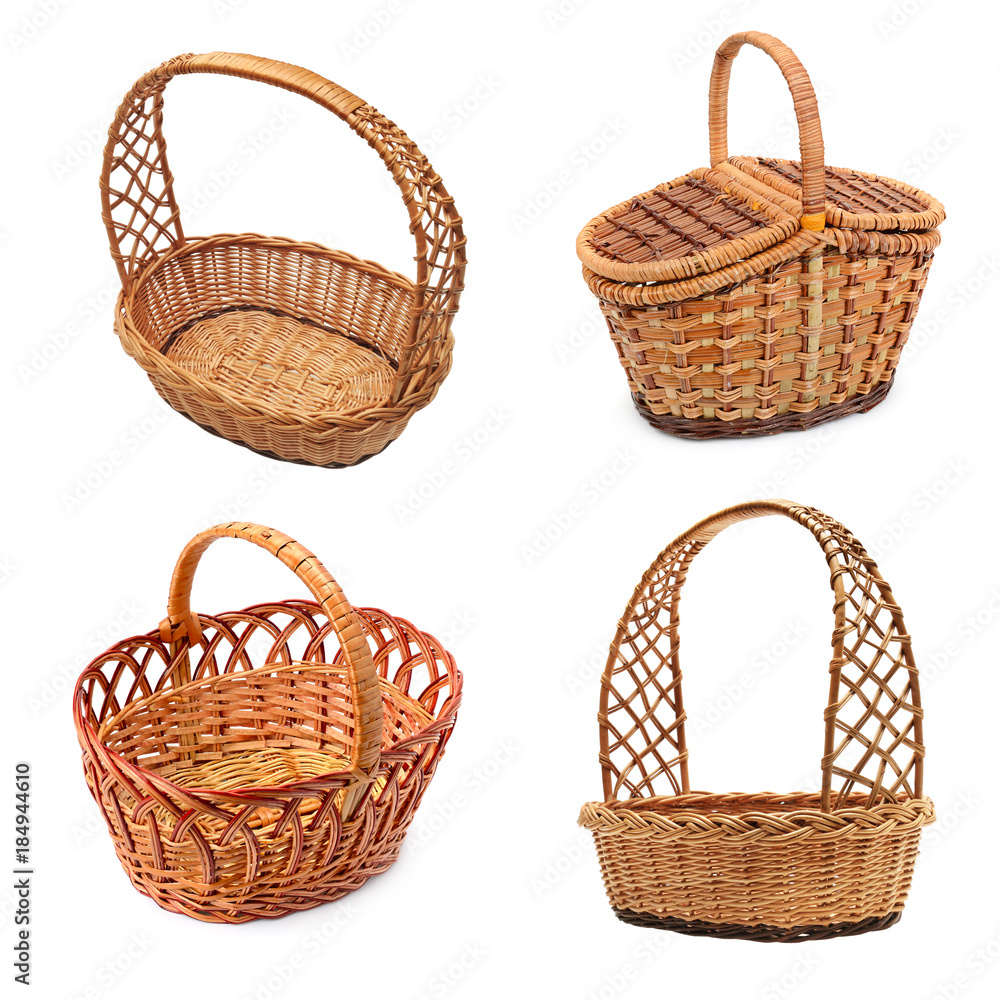 Set of wooden empty baskets isolated on white