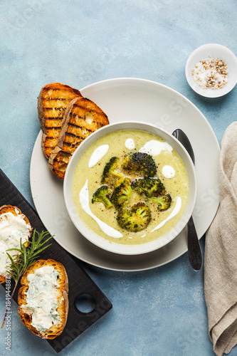 cream of broccoli soup and fresh grilled bread with sour cream and black pepper