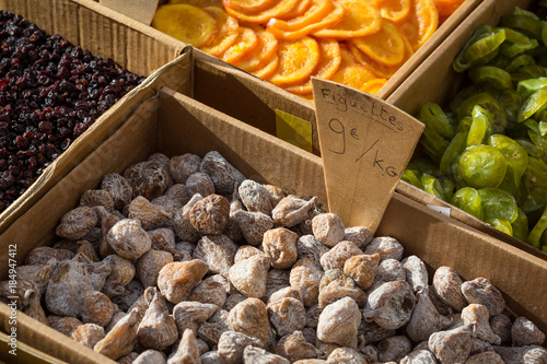 Figs and other types of dried fruits for sale on a local market in France, Europe.