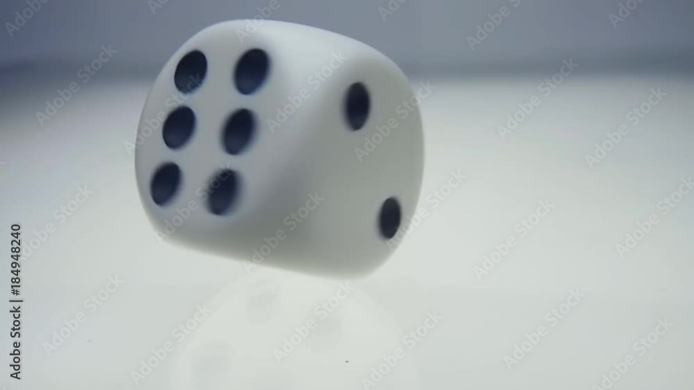 White dice falls spinning and jumps from the white glossy luminous surface and flies to the camera. Closeup. Slow mo, slo mo, slow motion, high speed camera, 240fps, 250fps
White dice falls spinning and jumps from the white glossy luminous surface and flies to the camera. Closeup. Slow mo, slo mo, slow motion, high speed camera, 240fps, 250fps