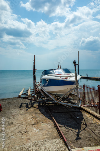 Boat on the shore wharf