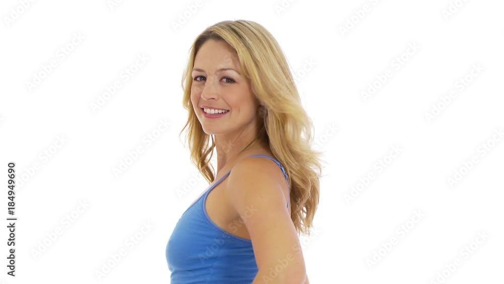 Sexy young woman smiling at camera on white background Sexy young woman smiling at camera on white background