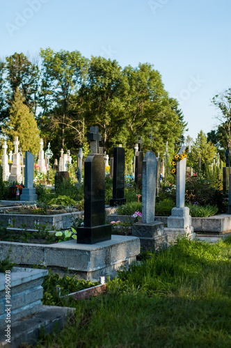 Old monuments and crosses on the classical European Catholic cemetery.