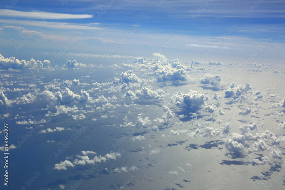Naklejka premium Aerial view beautiful white clouds in blue sky. Nice background.