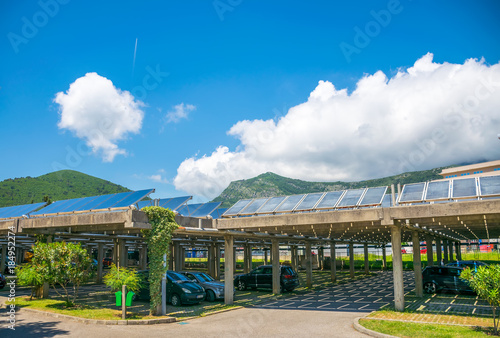 MONTENEGRO, BUDVA - May 30/2017: employees parked their cars under solar panels on the territory of the power plant.