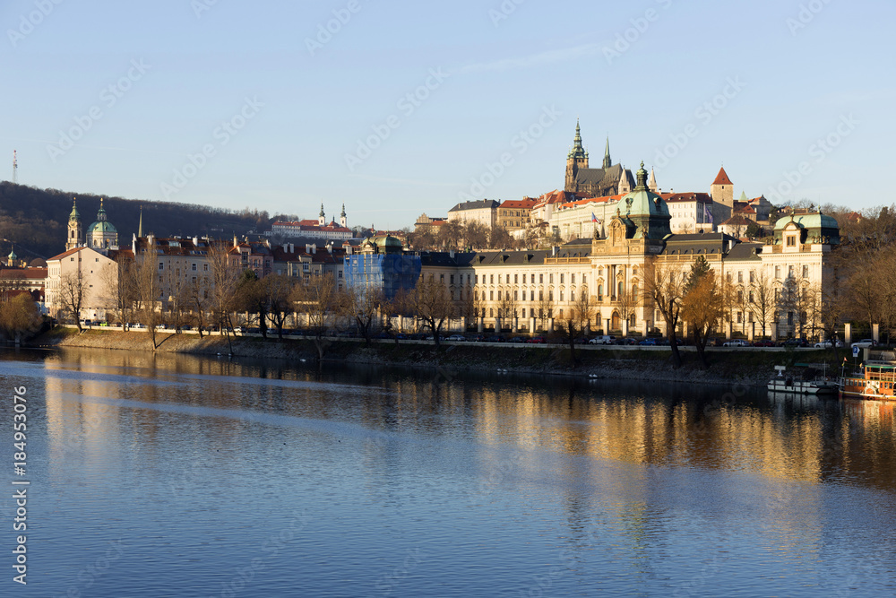 View on the winter Prague gothic Castle above River Vltava in the sunny Day, Czech Republic